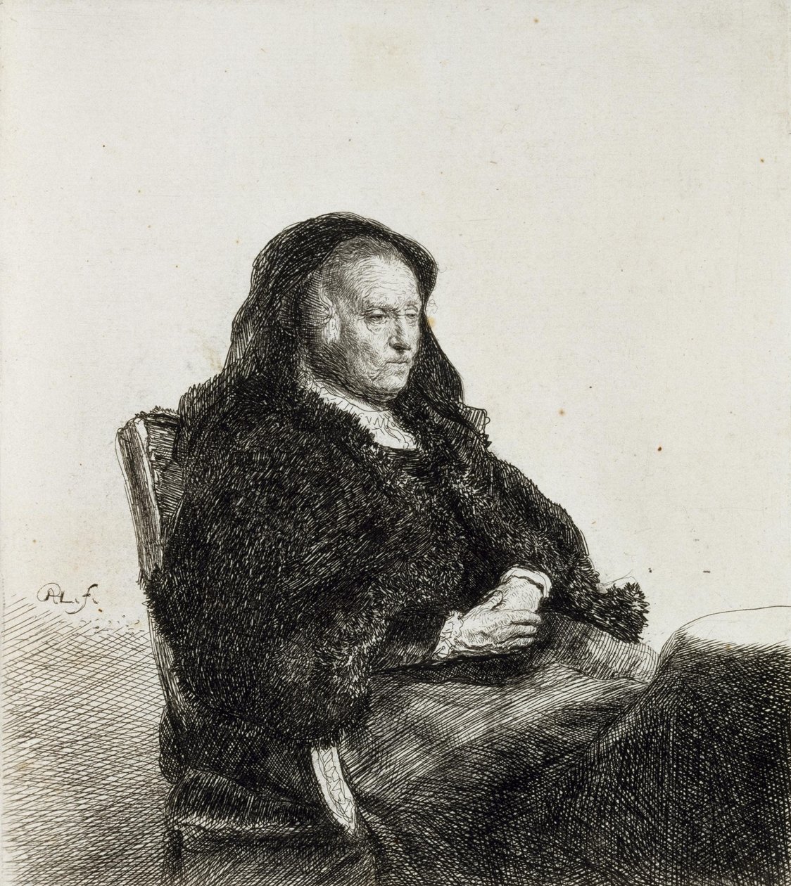 Artistenes mor sitter ved et bord av Rembrandt van Rijn