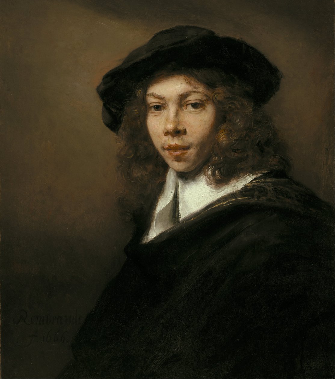 Ung mann i en svart basker av Rembrandt van Rijn