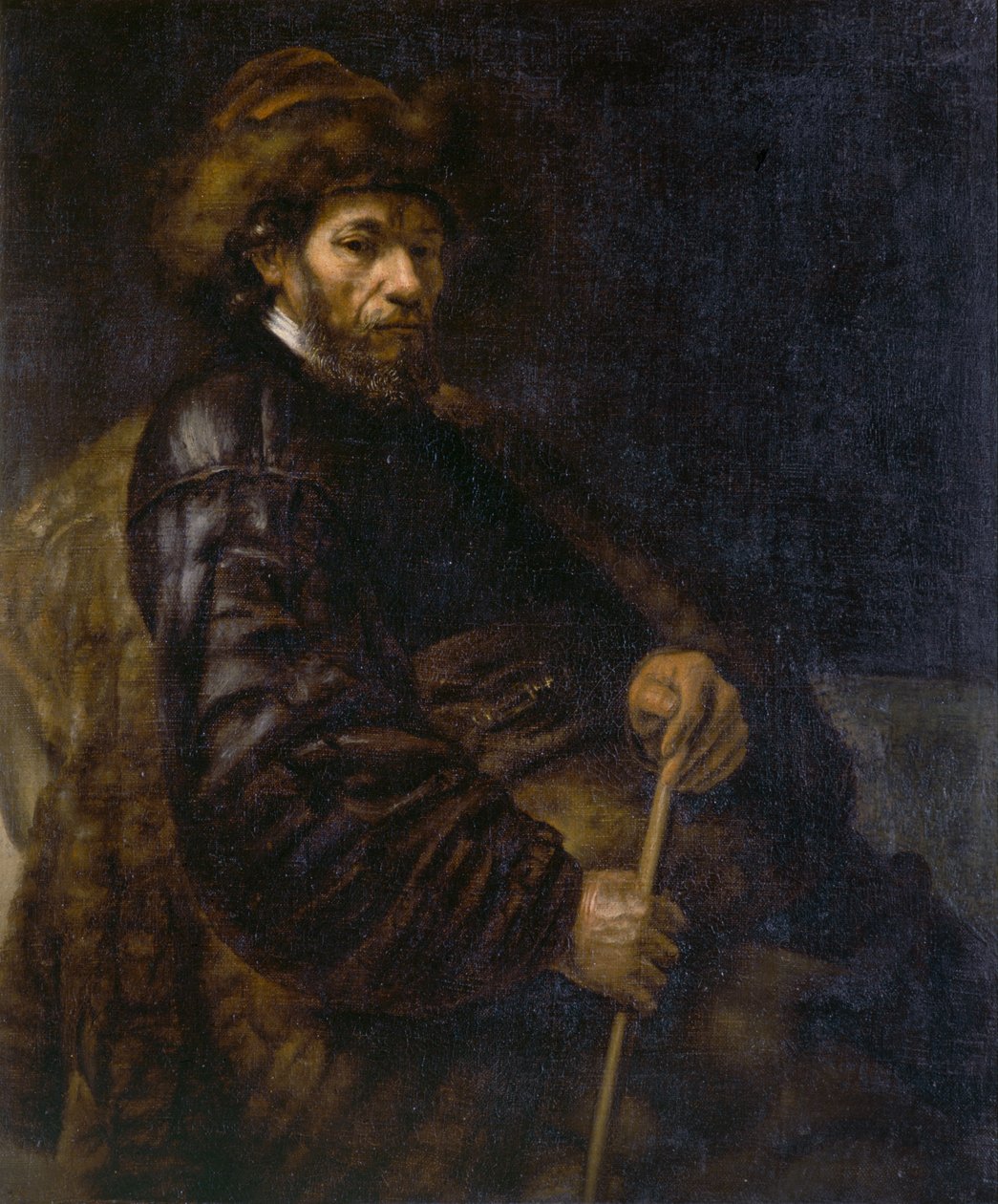 En sittende mann med en pinne (olje på lerret) av Rembrandt Harmensz. van Rijn