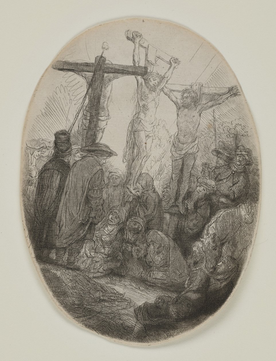 Kristus korsfestet mellom to tyver: en oval plate, ca. 1641 (etsing og tørrnipp) av Rembrandt van Rijn