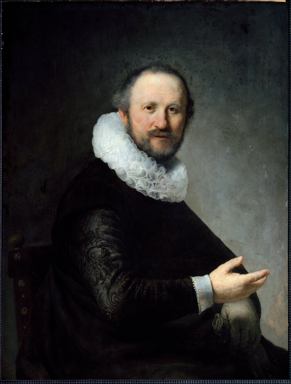 Dutch Bourgeois holder hanskene, iført en ruff. (Maleri av Rembrandt van Rijn