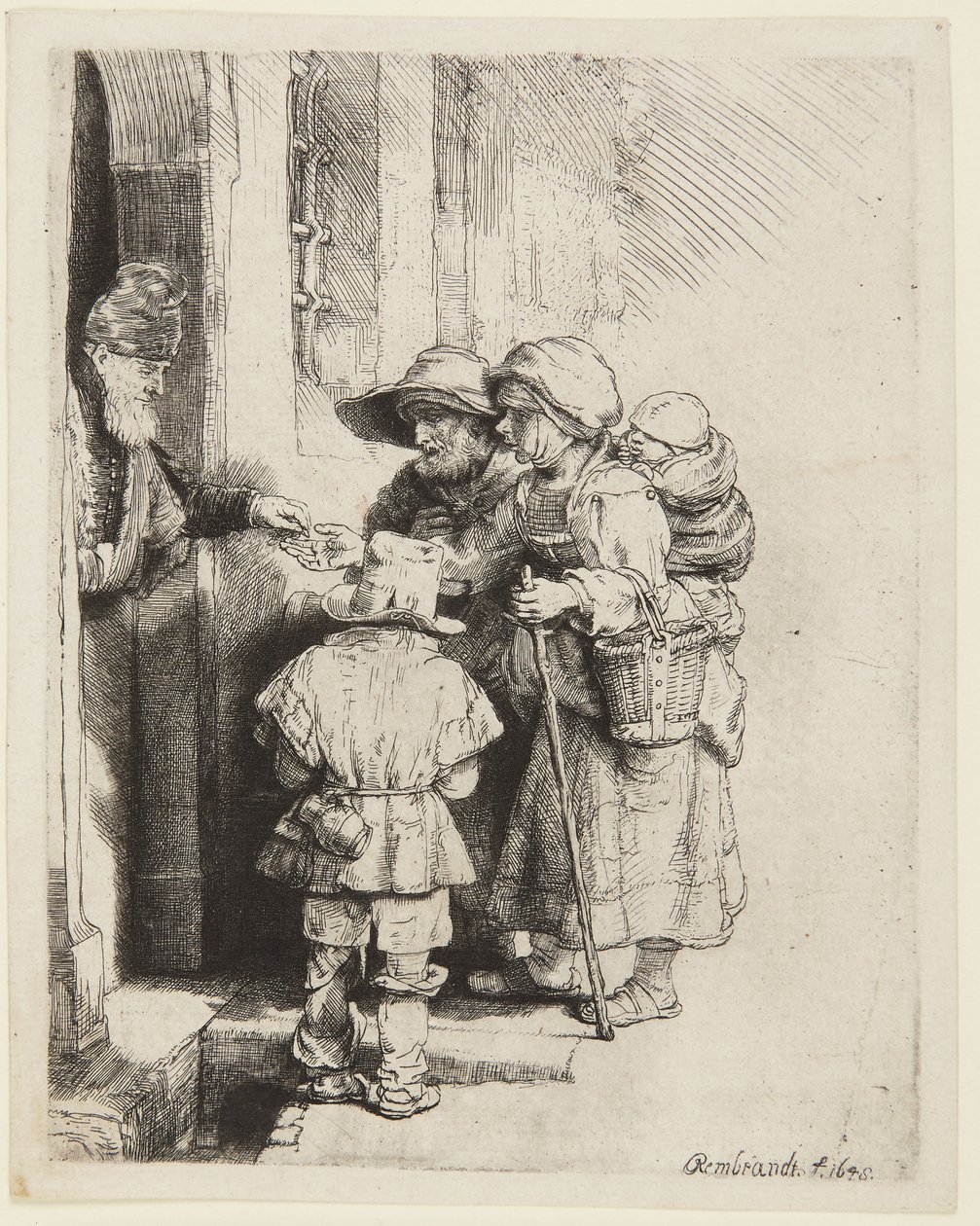 En blind hurdy-gurdy-spiller og familien hans mottar almisser av Rembrandt van Rijn