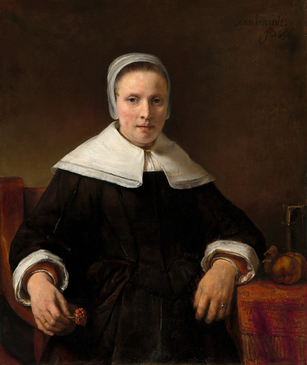 En kvinne som holder en rosa av Rembrandt van Rijn