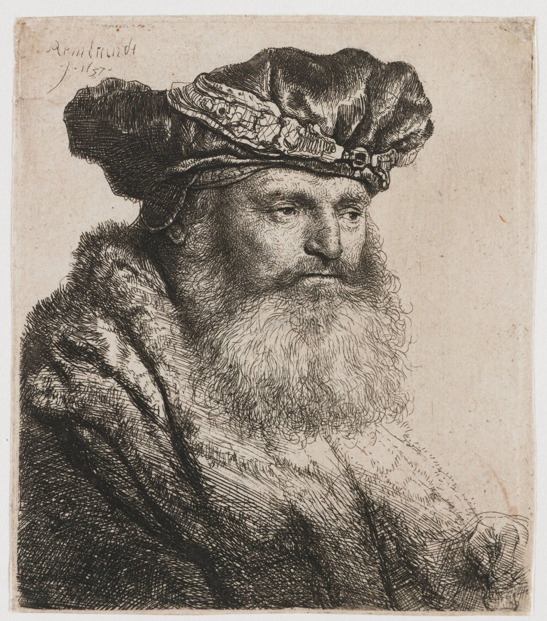 Skjeggete mann i fløyelshette med juvellås av Rembrandt van Rijn