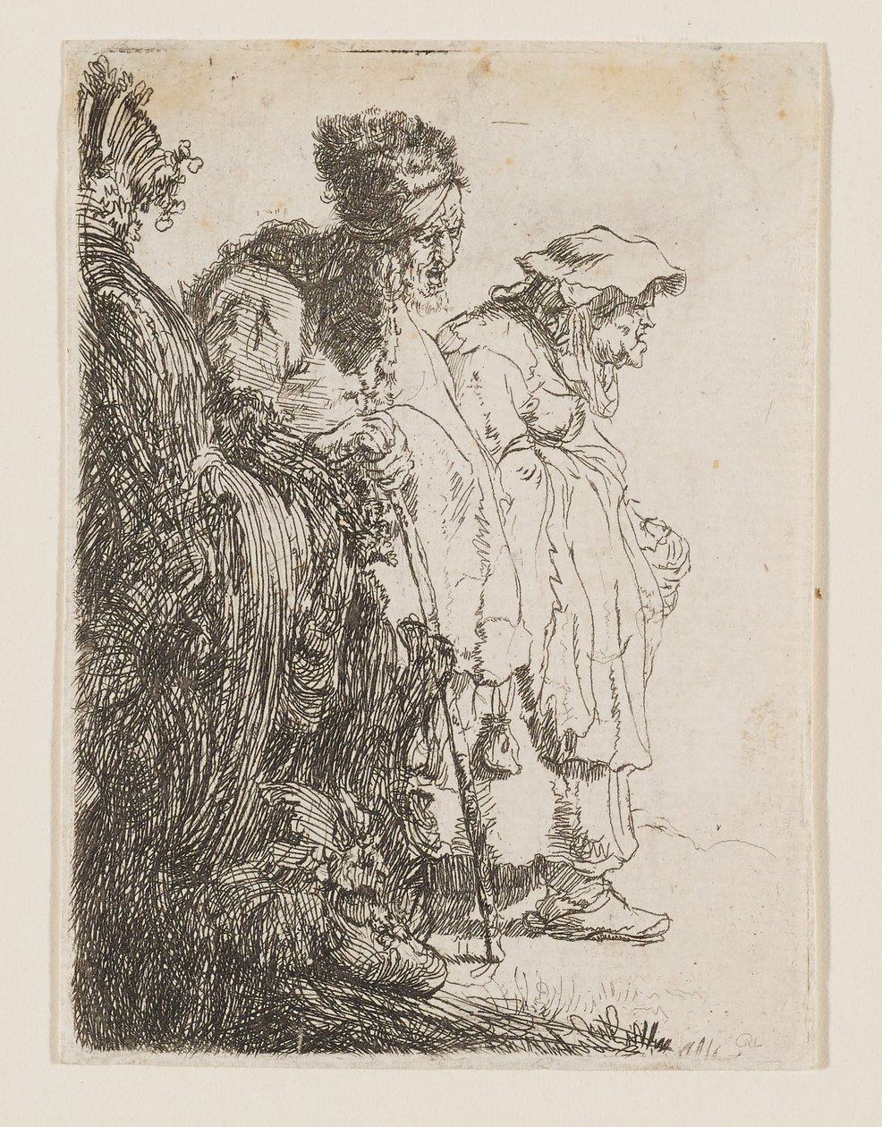 En tigger og en tiggerkvinne bak en bank av Rembrandt van Rijn