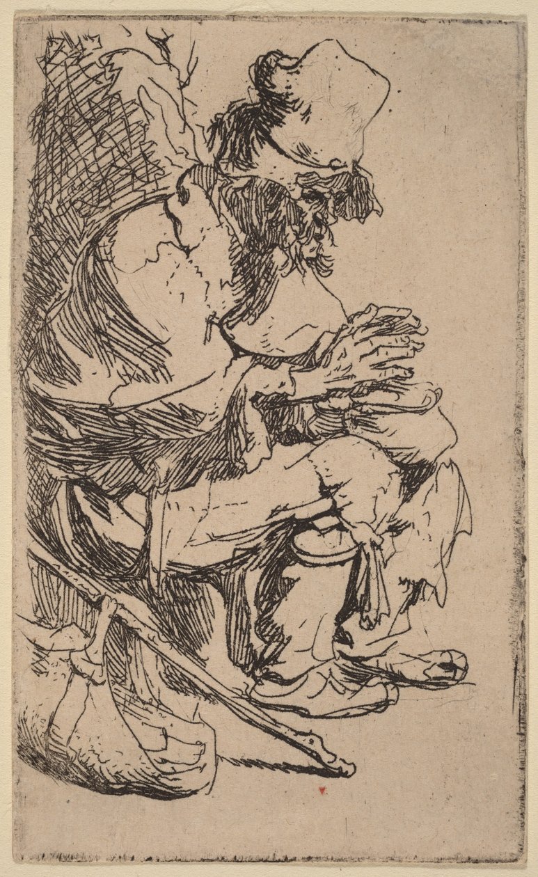 En tigger som sitter og varmer hendene ved en varmeskål av Rembrandt van Rijn