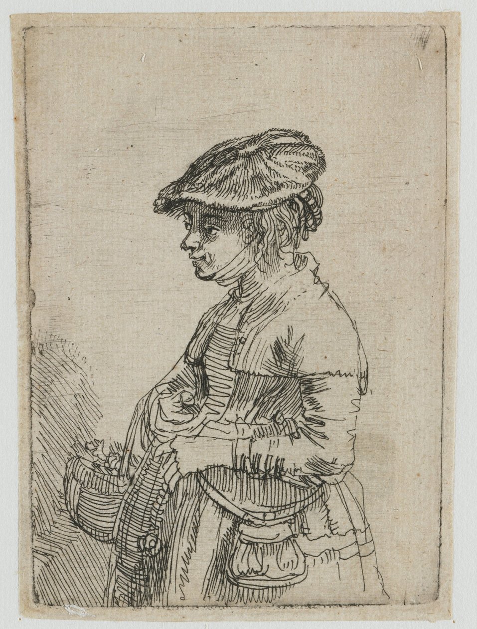 Jente med en kurv av Rembrandt van Rijn