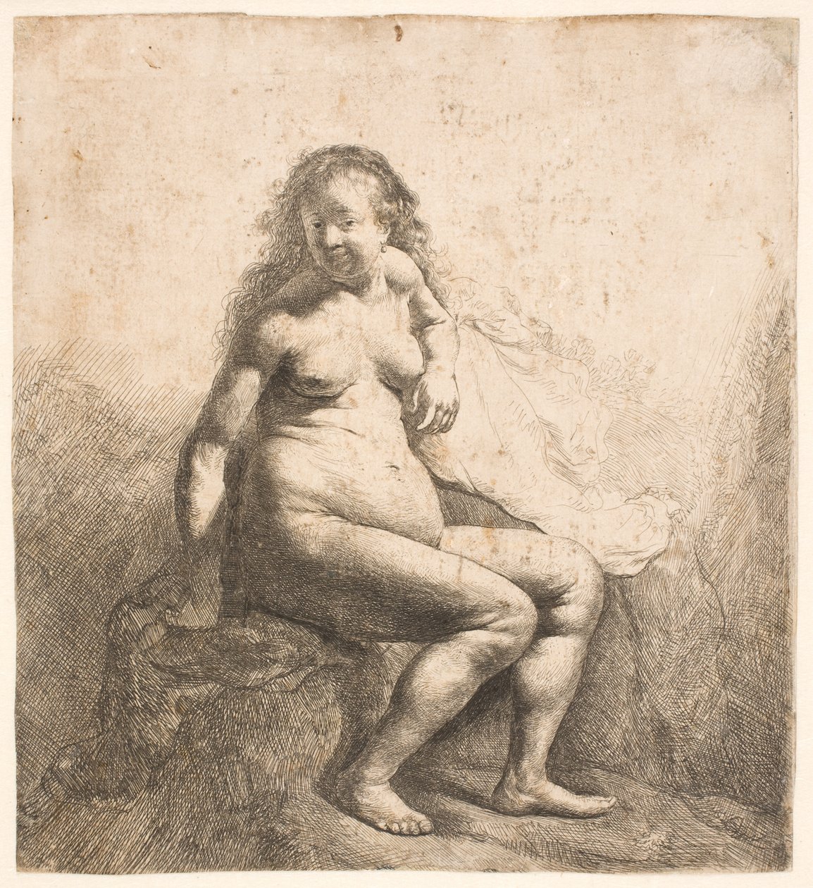 En naken kvinne som sitter på en haug av Rembrandt van Rijn