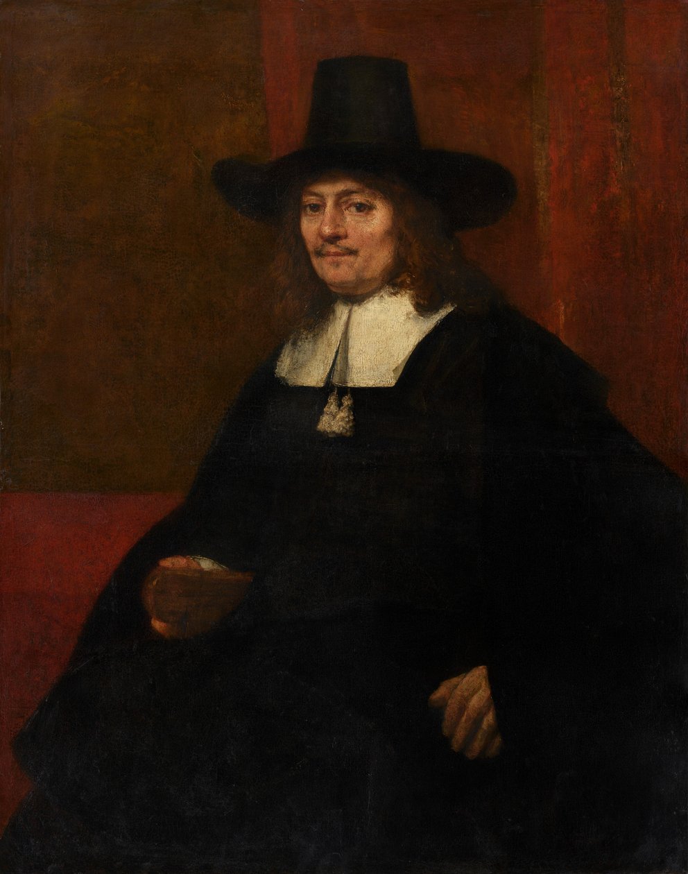 Portrett av en mann i en høy hatt av Rembrandt van Rijn