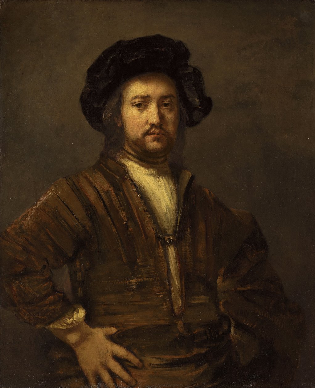 Portrett av en mann med armer akimbo av Rembrandt van Rijn