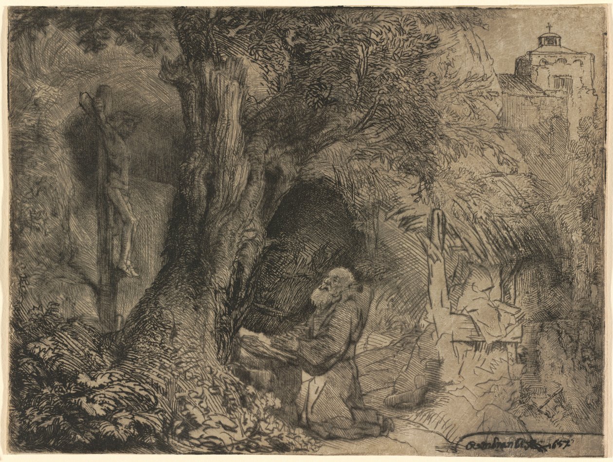 Saint Francis under et tre ber av Rembrandt van Rijn