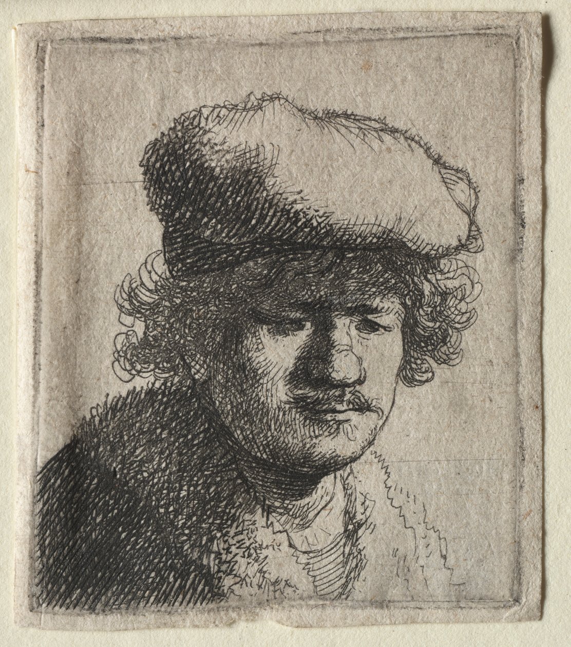 Selvportrett med hetten trukket forover av Rembrandt van Rijn