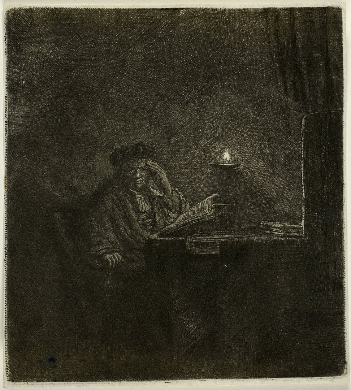 Student ved et bord ved levende lys av Rembrandt van Rijn