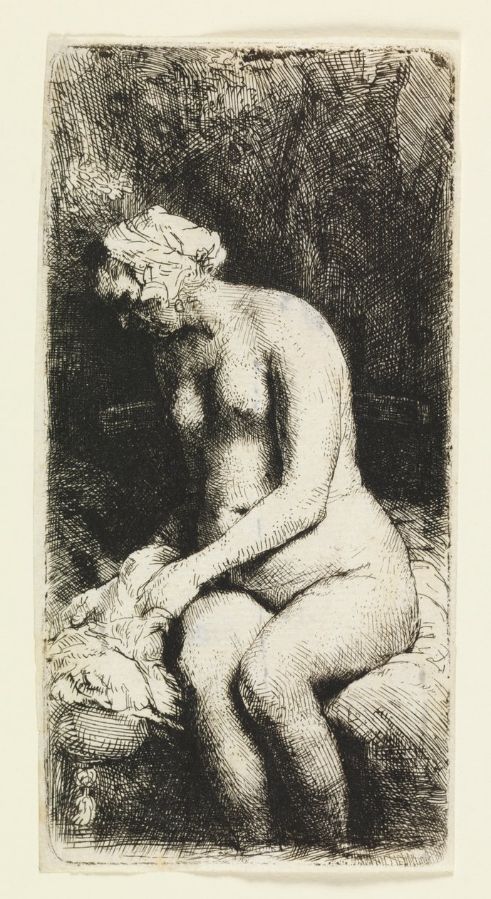 Kvinne som bader føttene ved en bekk av Rembrandt van Rijn