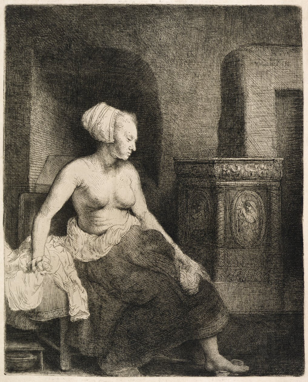 Kvinne som sitter halvkledd ved siden av en komfyr, 1658 av Rembrandt van Rijn