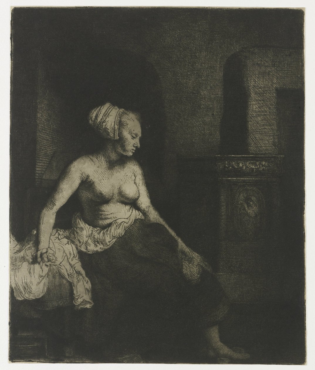 Kvinne som sitter halvkledd ved siden av en komfyr Kvinne som sitter halvkledd ved siden av en komfyr av Rembrandt van Rijn