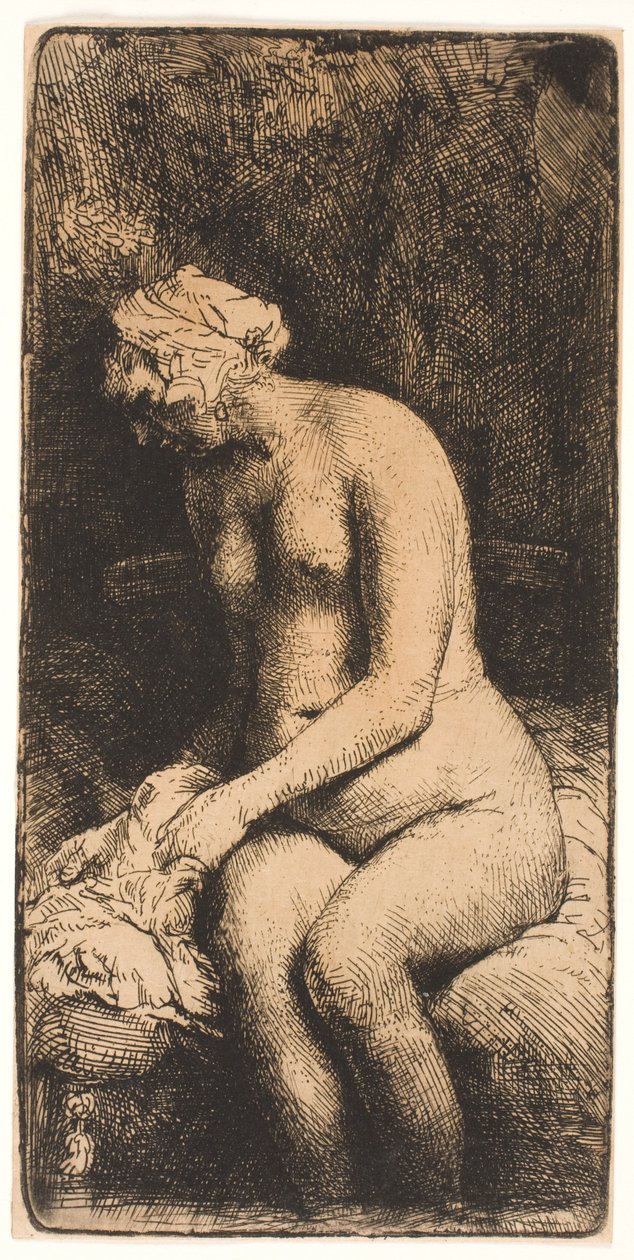Kvinne som bader føttene ved en bekk av Rembrandt van Rijn