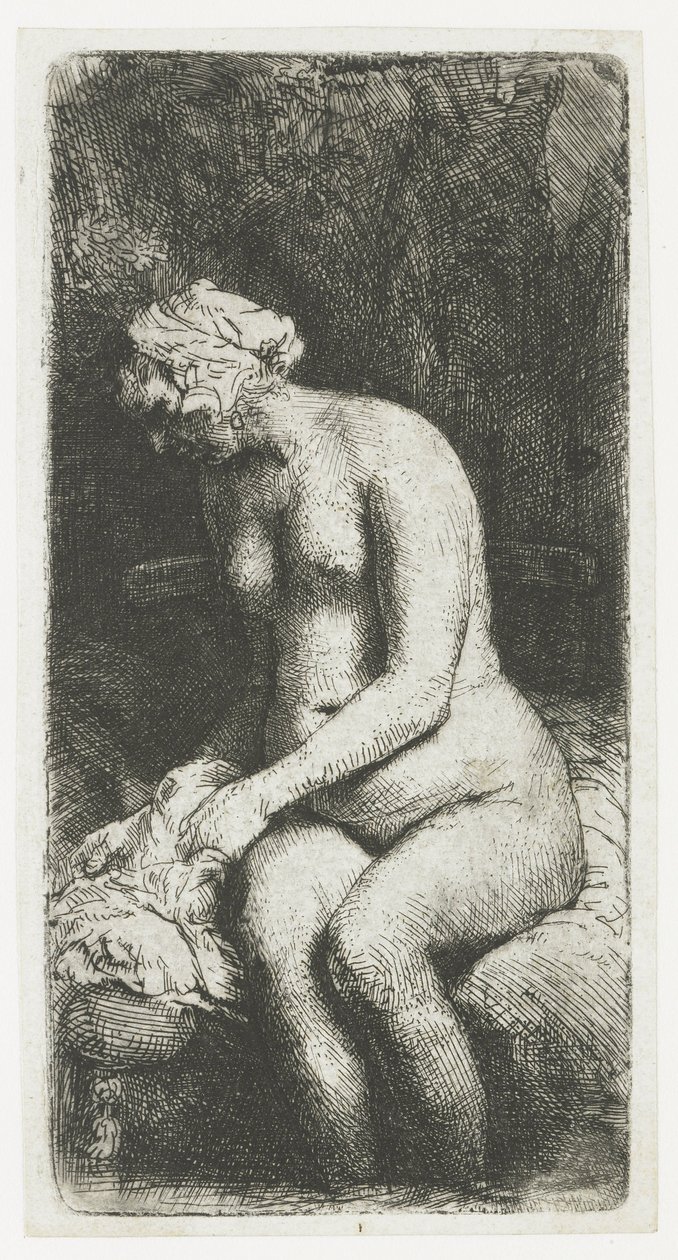 Kvinne som bader føttene ved en bekk av Rembrandt van Rijn