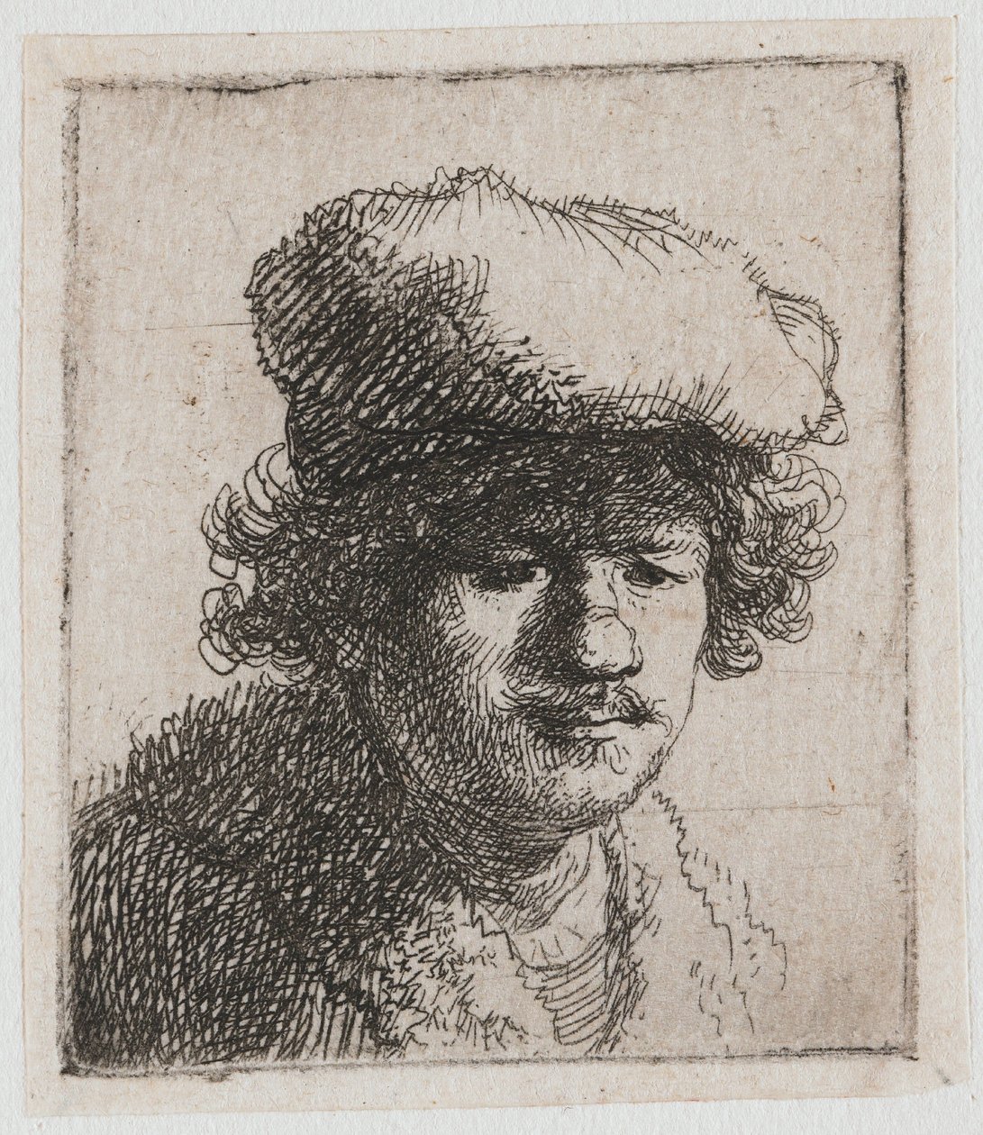Selvportrett med baretten trukket fremover av Rembrandt van Rijn