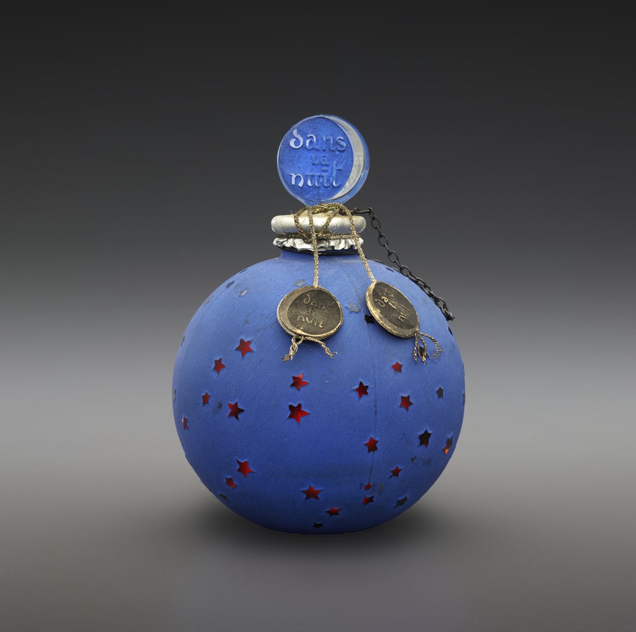 Dans la Nuit, flaske designet 1924, laget ca. 1930 (glass, emalje, papir, forgylt og metalltråd) av Rene Jules Lalique