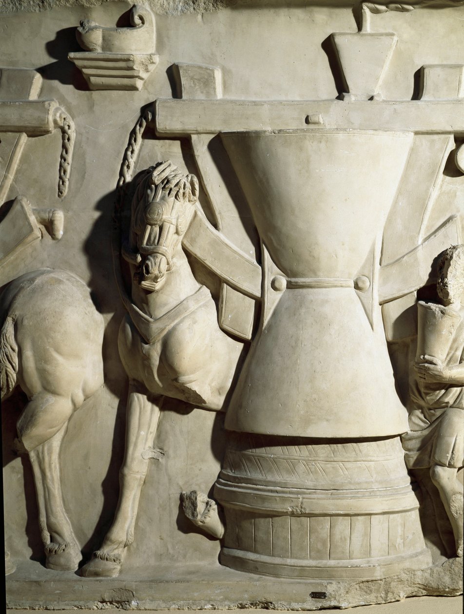 Romersk kunst: lavrelieff som representerer et kvernhjul. 1. århundre e.Kr. Roma Museo della Civilta Romana av Roman