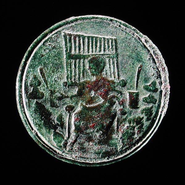 Romersk mynt som viser et orgel (bronse) av Roman