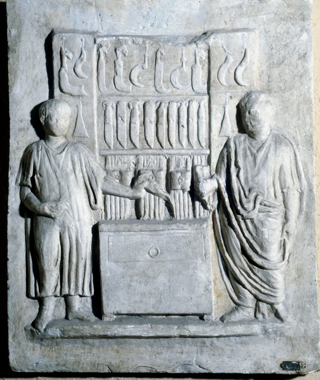 Tegn på knivbutikken i romertiden. Museo di Ostia (Ostia) av Roman Roman