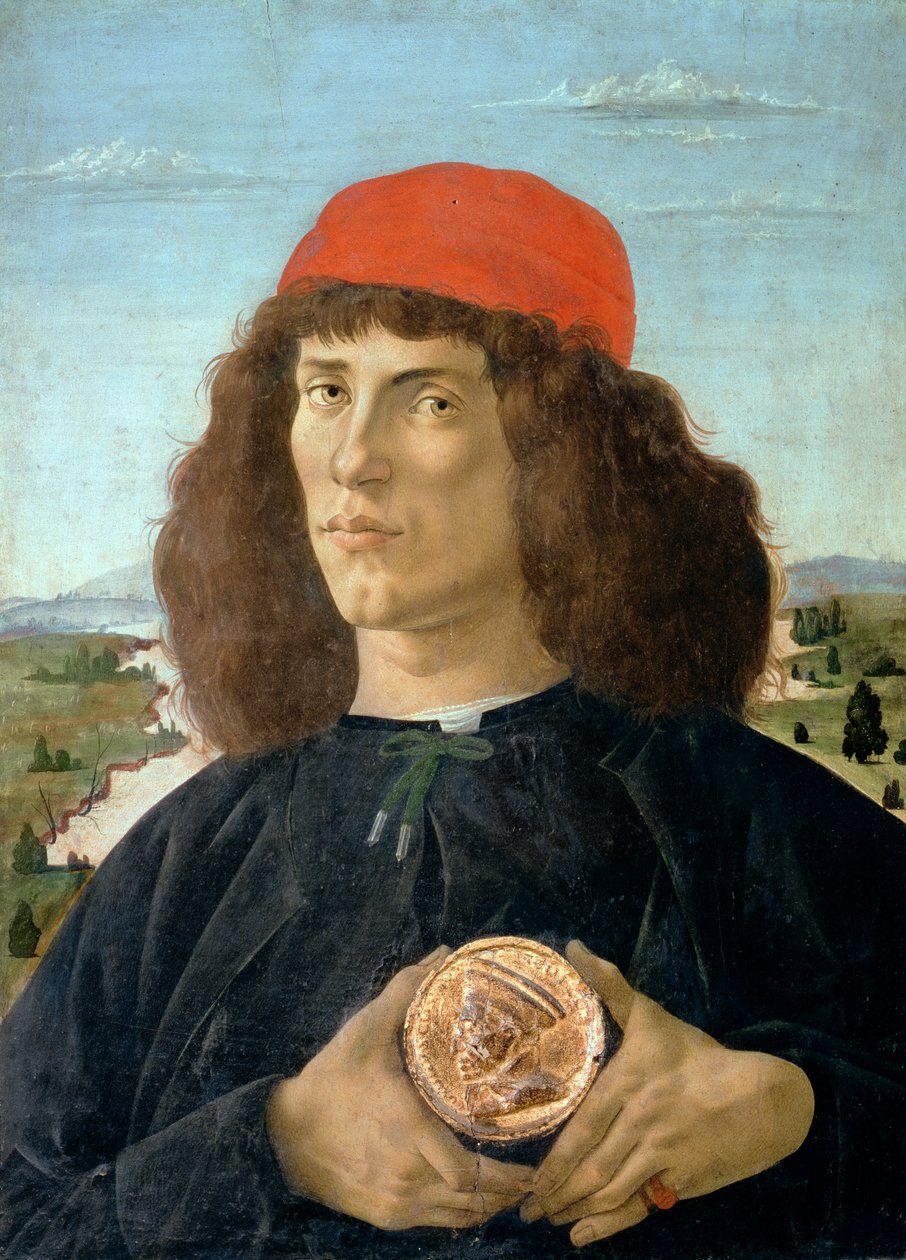 Portrett av en ung mann som holder en medaljong av Cosimo I de