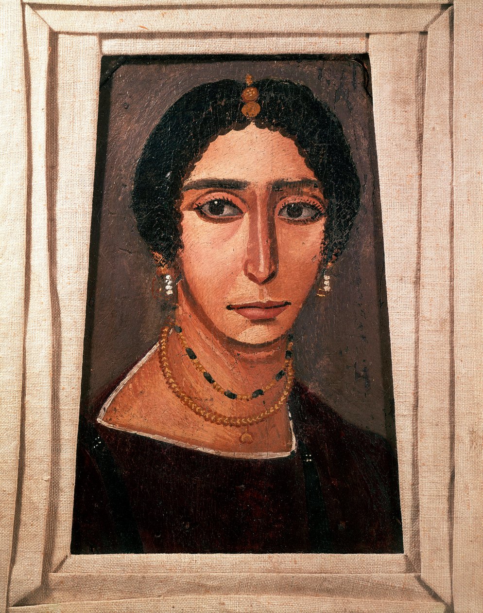 Egyptisk antikvitet: begravelsesportrett av en kvinne. Maling på tre. 2. eller 3. århundre. Fra Fayum (Fayum) i Egypt. Paris. Museet Louvre av School Egyptian