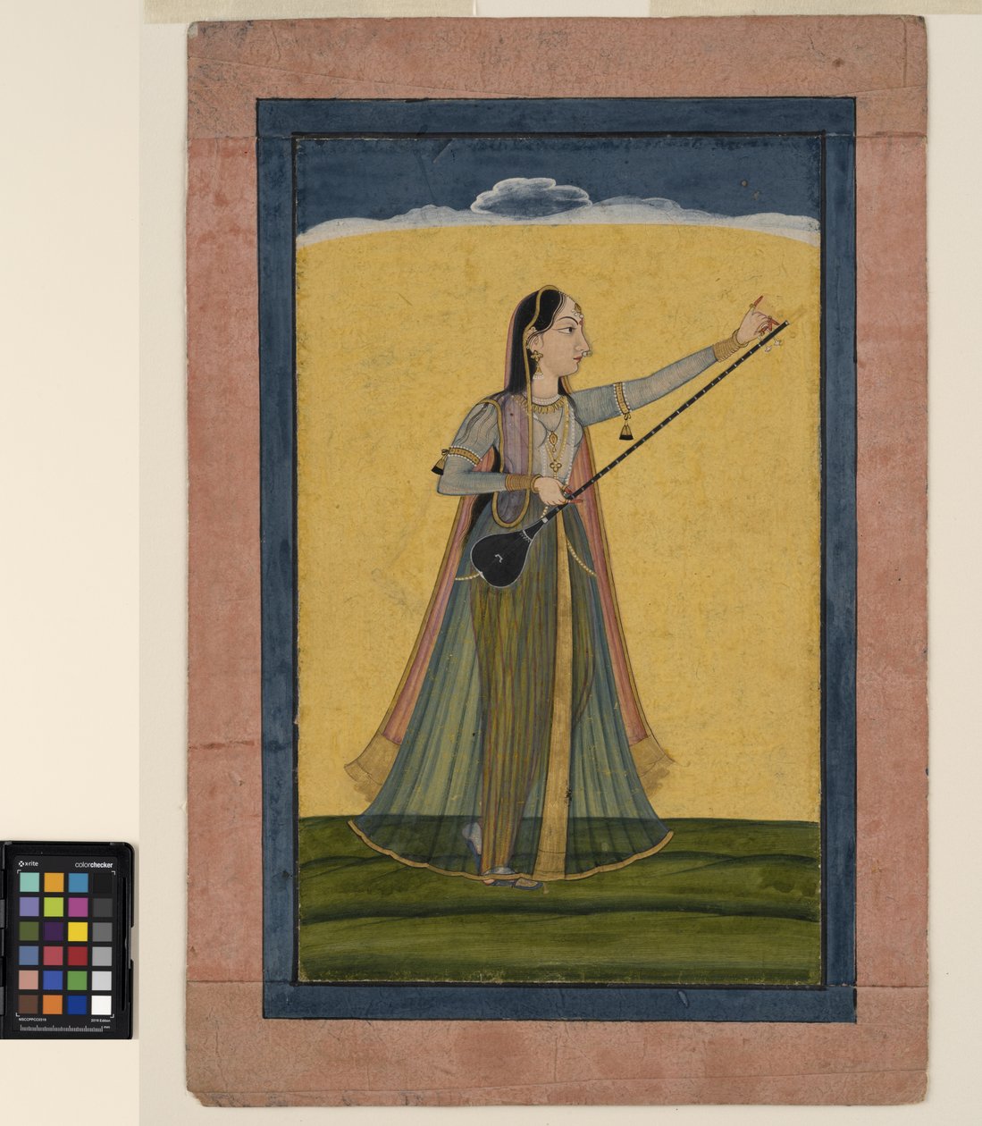 En kvinne stemmer sin tambura, ca. 1740 (ugjennomsiktig akvarell på papir) av School Pahari