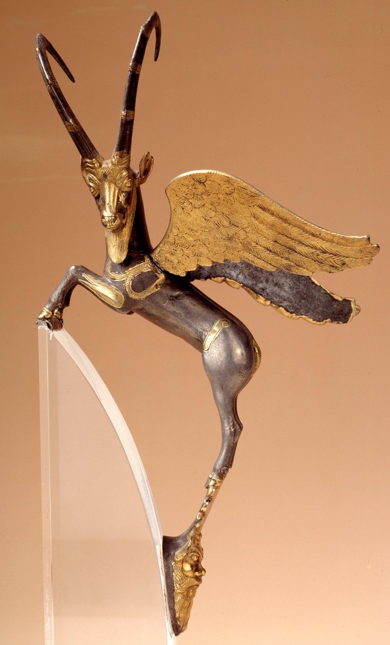 Apparathåndtak: sølvvingebukk, innlagt, gull. Persisk periode routenide (6.–4. århundre f.Kr.), kommer fra Iran. Paris, musee du Louvre - Seremonielt håndtak: bevinget steinbukk i sølv, innlagt, gull. Achaemenid persisk periode (6.-4. århundre f.Kr.), fra  av School Persian