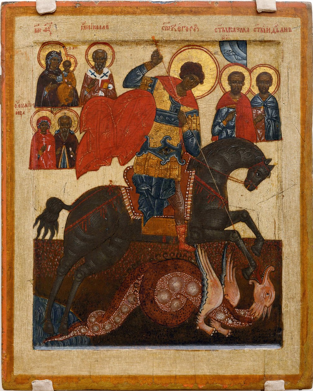 Saint George og dragen, omgitt av flere helgener - russisk ikon: Saint George med utvalgte hellige. Tempera på panel av School Russian