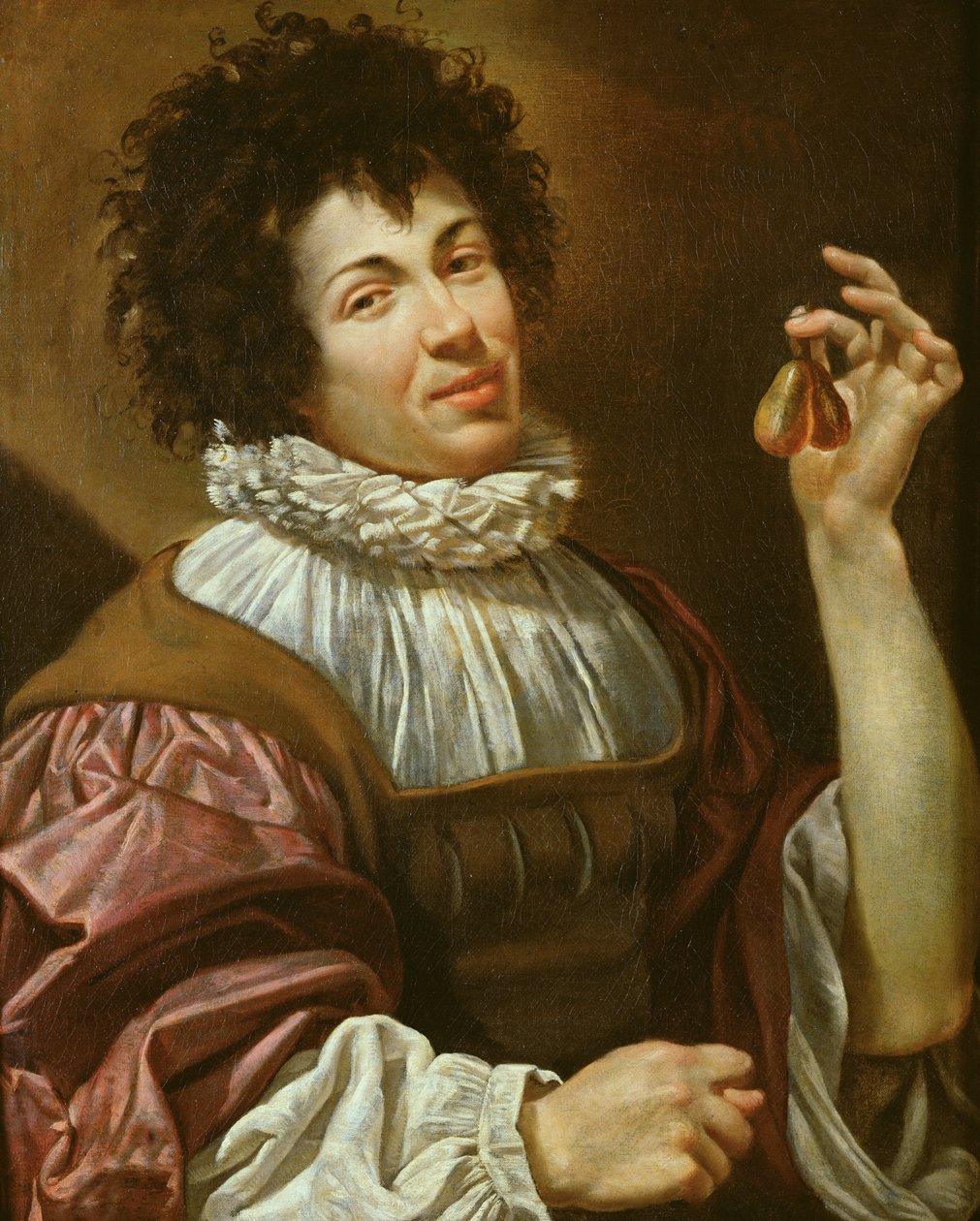 Ung mann med en fiken, ca. 1620-30 av Simon Vouet