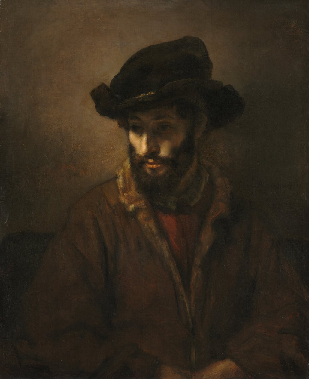 En skjeggete mann med hatt av Studio of Rembrandt van Rijn