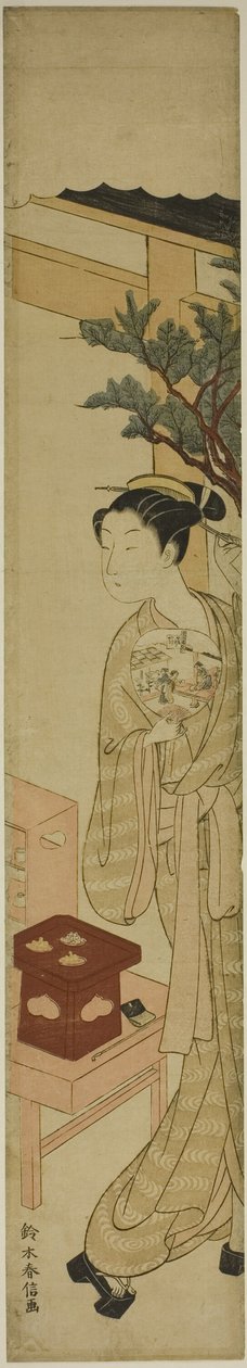 Servitrisen Osen fra Kagiya Teahouse holder en vifte av Suzuki Harunobu