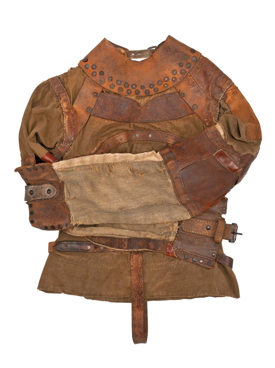 Tvangstrøye eid av Harry Houdini, ca. 1915 (khaki lerret, lær og metallnagler) av Swanfeldt Tent and Awning Co.