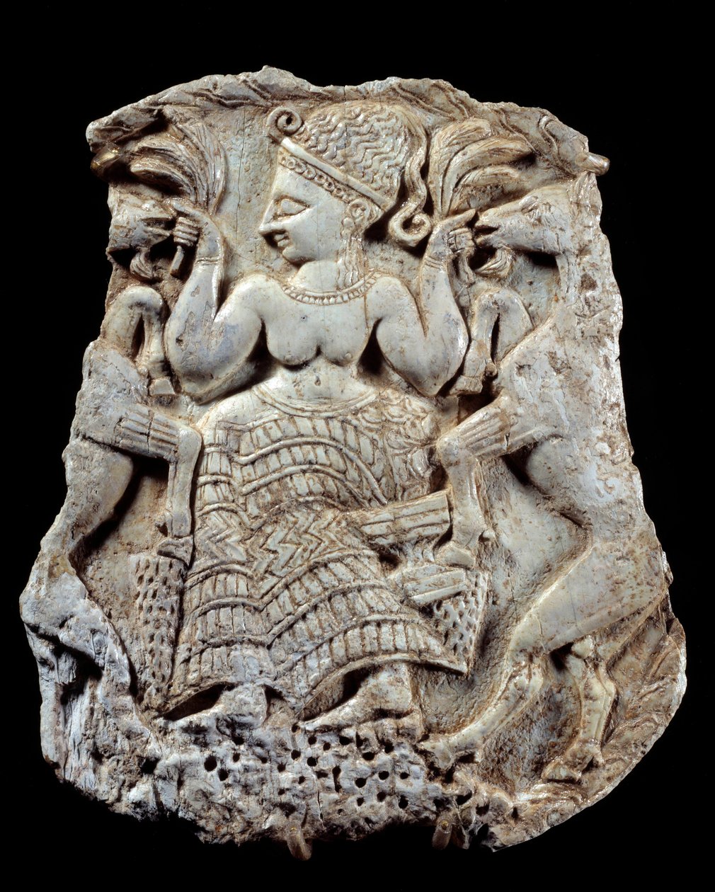 Utskåret elfenbenslokk: Mykensk gudinne av fecondite som dyremester. Fra Twink El Beida, Syria. 1200-tallet f.Kr. Paris, Louvre-museet av Syrian Syrian