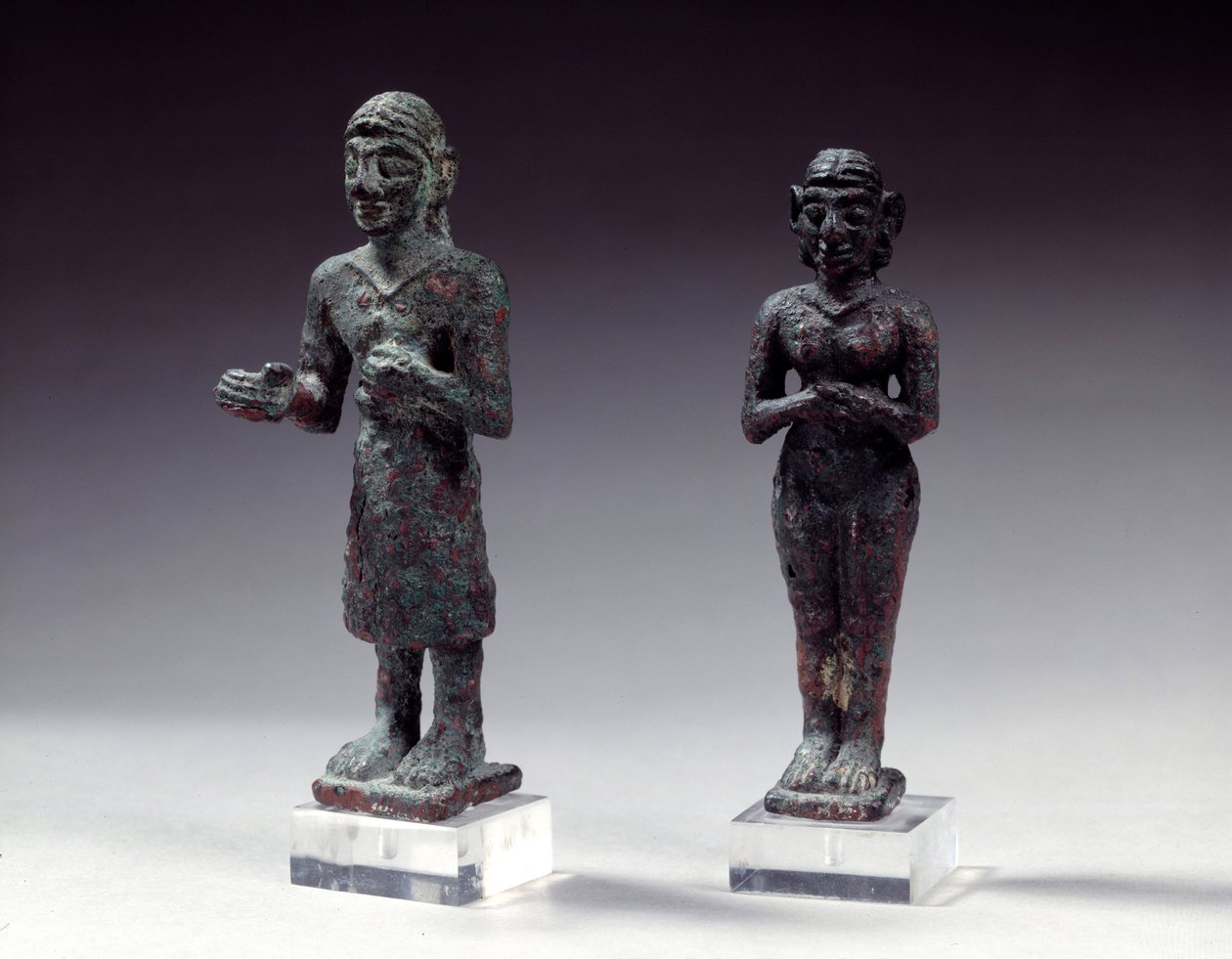 Statuetter av tilbedere og gudinne i bronse, fra Syria 2300-2000 f.Kr. Paris, Louvre-museet av Syrian Syrian