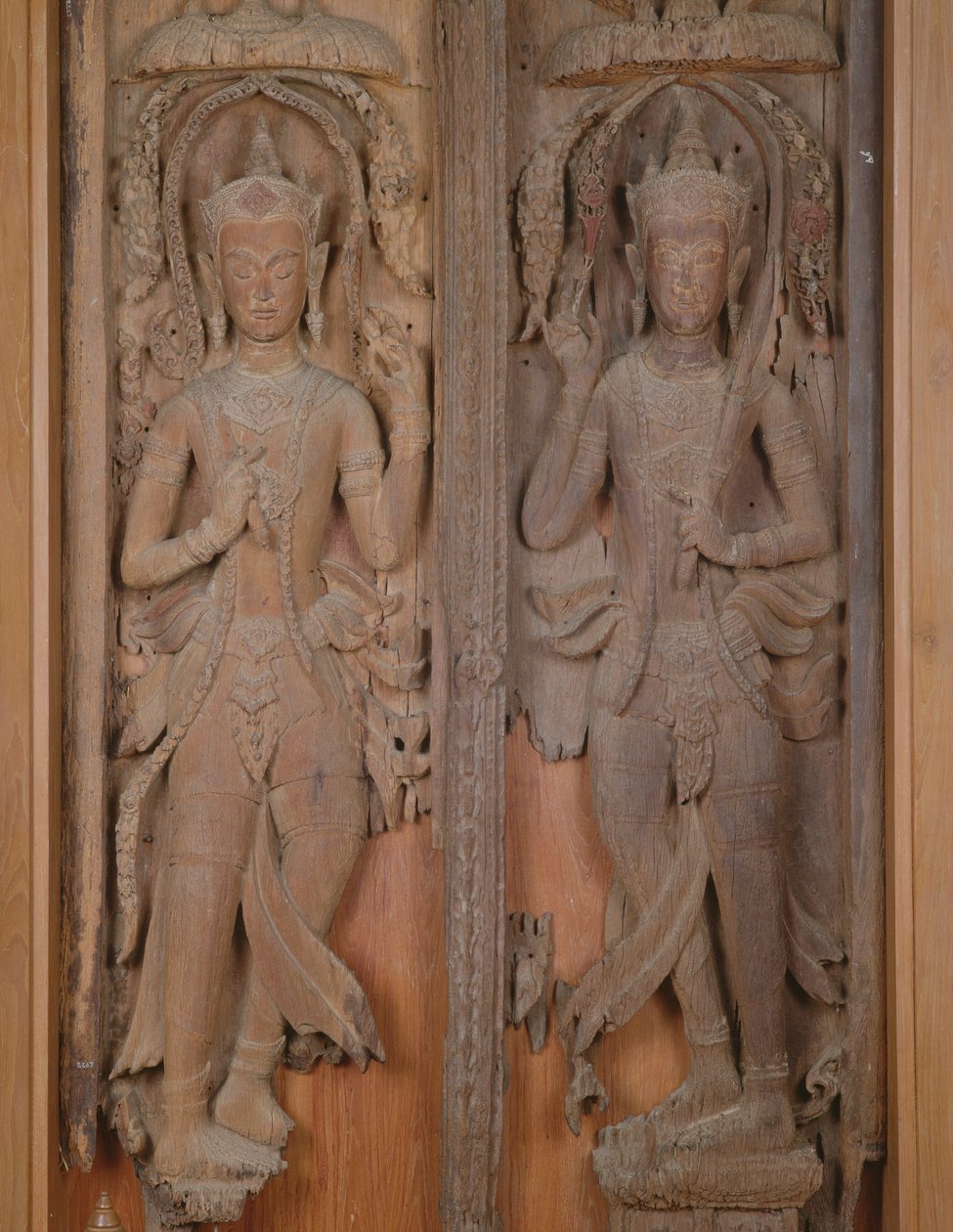 Panel av en port med to Deva (tre) av Thai School