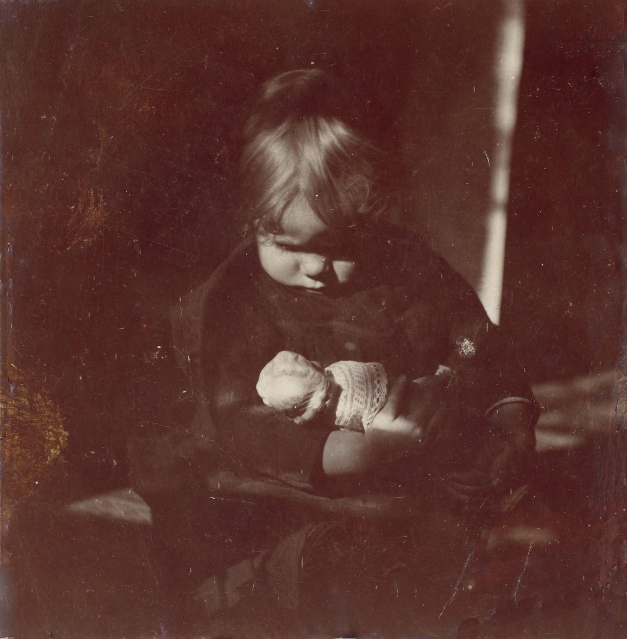 Betty Reynolds med Doll on Lap, ca. 1885. av Thomas Eakins