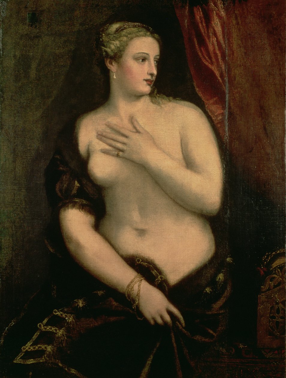 Venus vurderer refleksjonen hennes i et speil av Tiziano Vecelli
