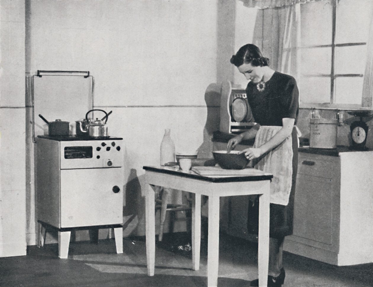 Et britisk kjøkken utstyrt med en skapgasskomfyr, 1942. av Unbekannt