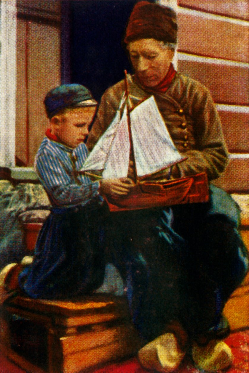Nederlandsk far og sønn i tradisjonell kjole, c1928. av Unbekannt