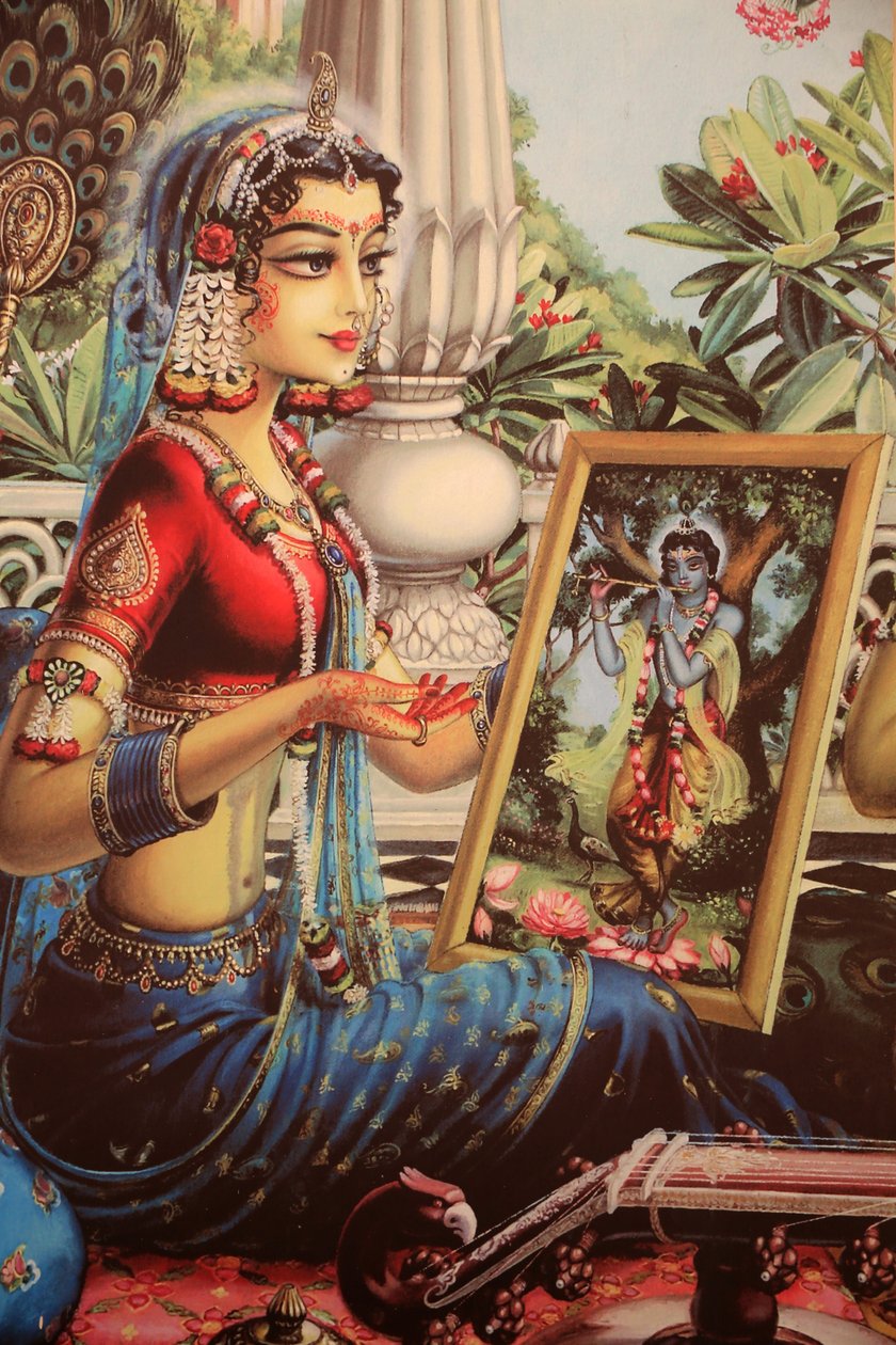 Maleri som viser Radha som ser på et bilde av Krishna. India av Unbekannt