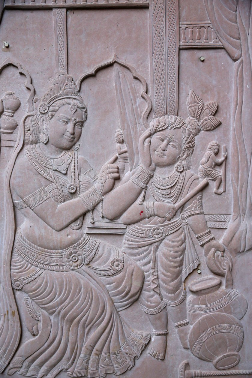 Relieff som viser hinduguden Krishna med stemoren Yashodha. India av Unbekannt
