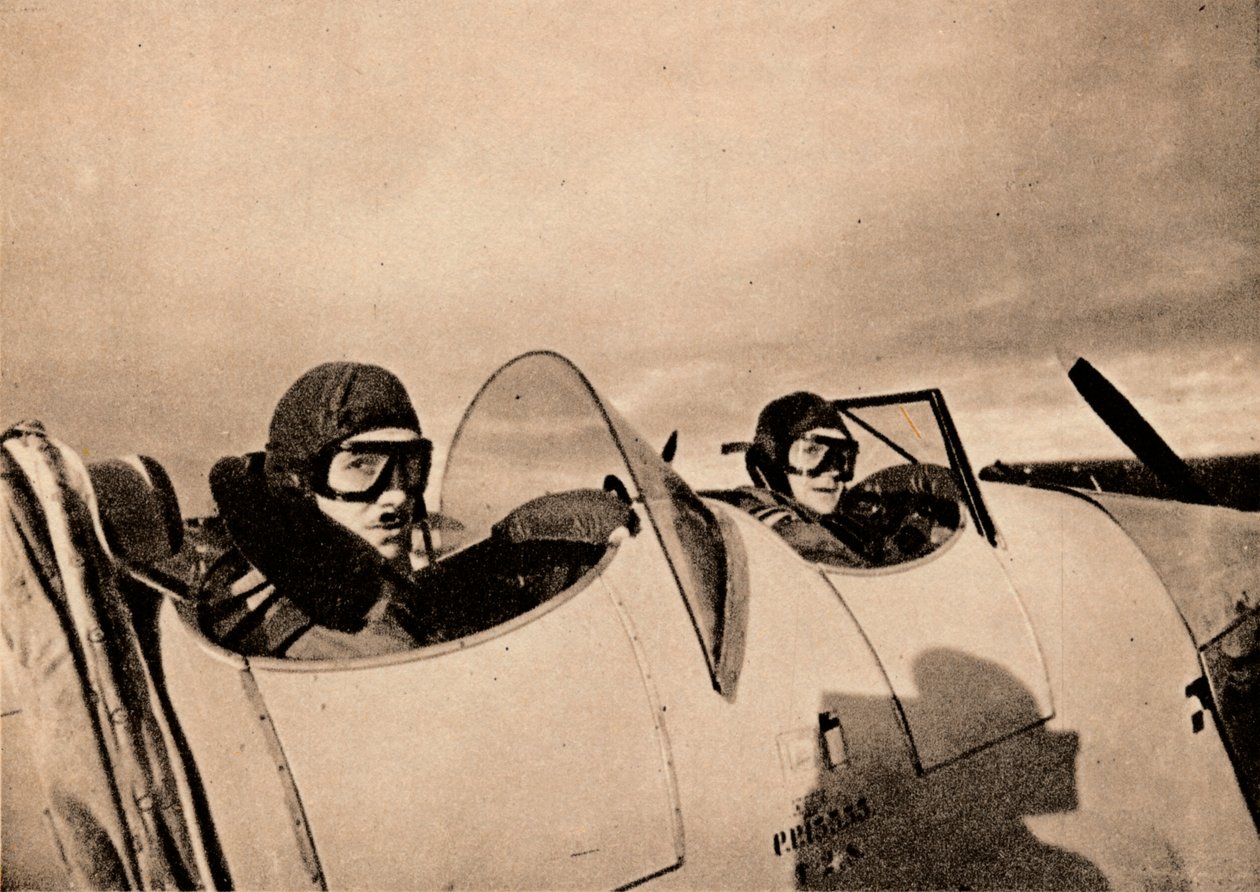 Starter på en instruksjonsflyvning i en Miles Magister. Eleven er i den bakre cockpiten, 1940 av Unbekannt