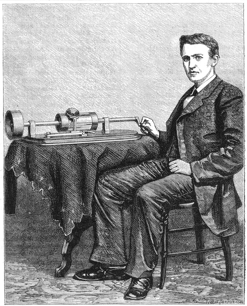 Thomas Alva Edison, amerikansk oppfinner, med en tidlig hånddrevet modell av sin fonograf, 1878 av Unbekannt