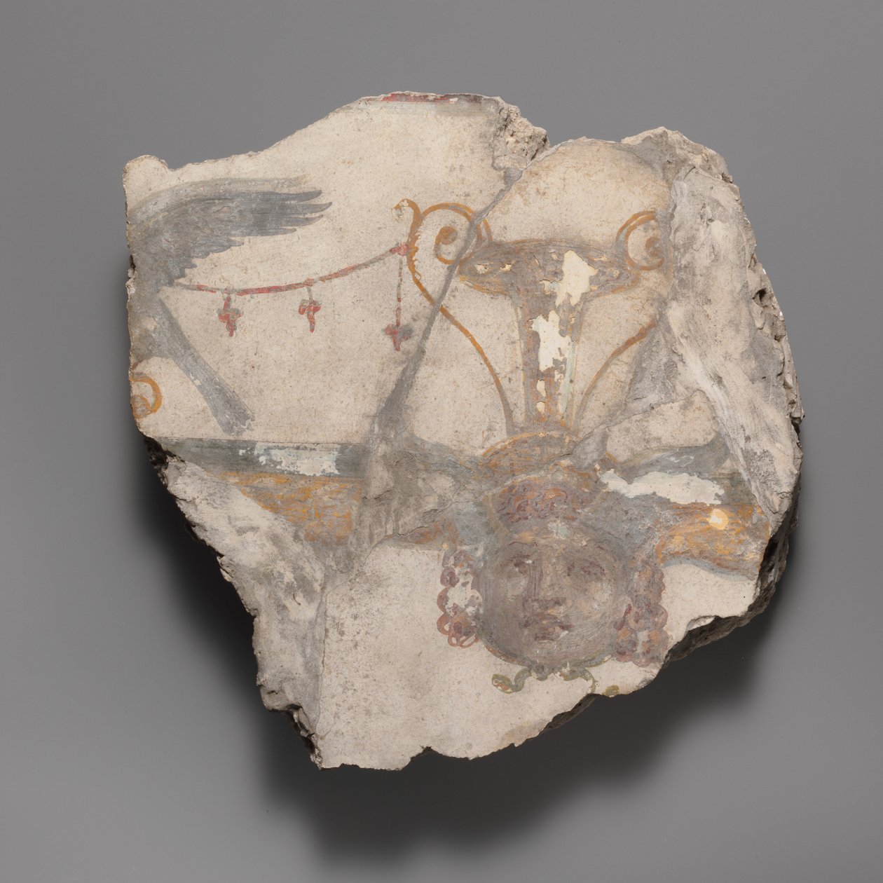 Veggmaleri fragment med Gorgon maske, ca. 14–68 e.Kr. av Unbekannt
