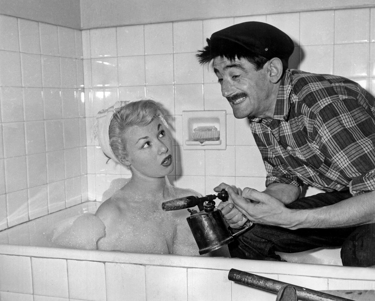 Nadine Tallier (ble baronesse Nadine De Rothschild) og Maurice Gardett under Soiree Chez Lui i Paris 27. mars 1961 av Unbekannt Unbekannt