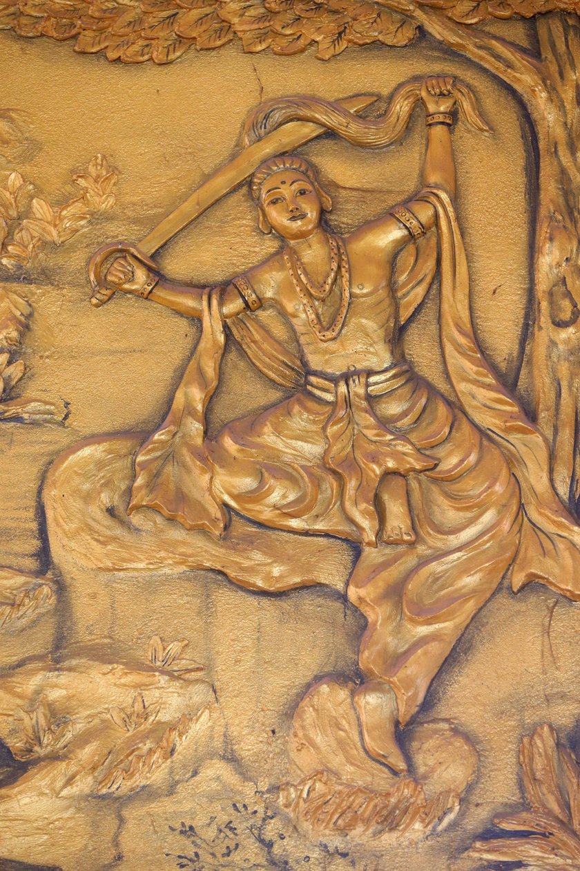 Chua Thiep Long buddhistpagode. The Great Tonsure: Buddha klipper håret med sverdet sitt. Så byttet han prinsens klær til en tiggerkåpe. Så begynte han sin søken etter opplysning Thay Ninh. Vietnam av Unbekannt